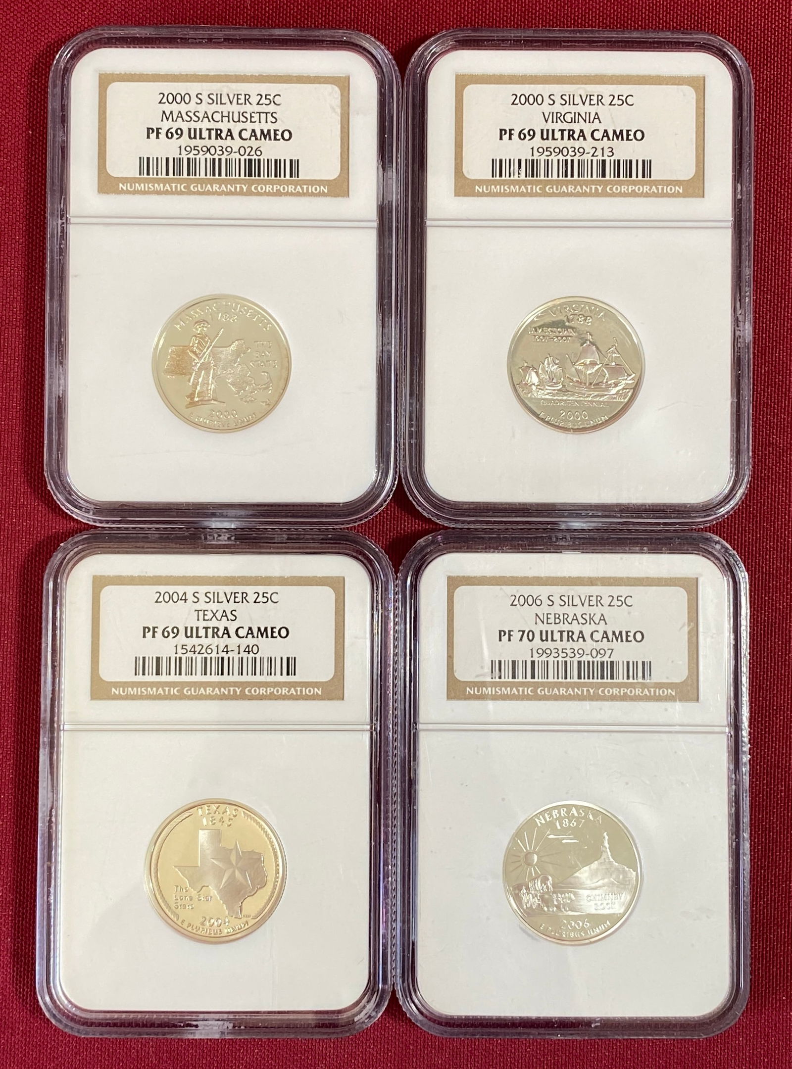 Four NGC Graded Ultra Cameo U.S. Silver State Quarters - PF69 - 2000-S Massachusetts & Virginia,: Four NGC Graded Ultra Cameo U.S. Silver State Quarters - PF69 - 2000-S Massachusetts & Virginia, 2004-S Texas PF70 - 2006-S Nebraska