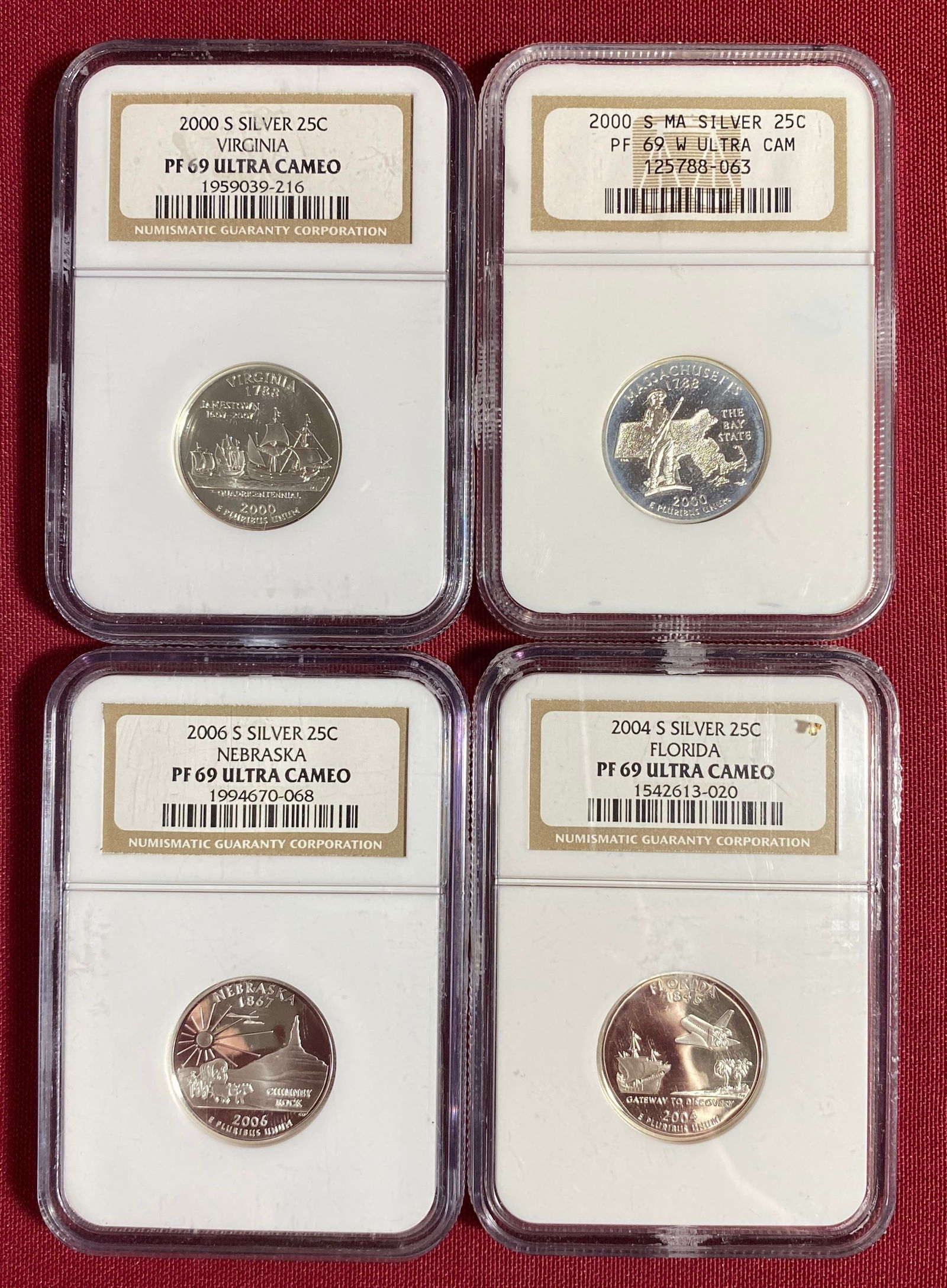 Four NGC Graded PF69 Ultra Cameo U.S. Silver State Quarters - 2000-S Massachusetts & Virginia,: Four NGC Graded PF69 Ultra Cameo U.S. Silver State Quarters - 2000-S Massachusetts & Virginia, 2004-S Florida, 2006-S Nebraska