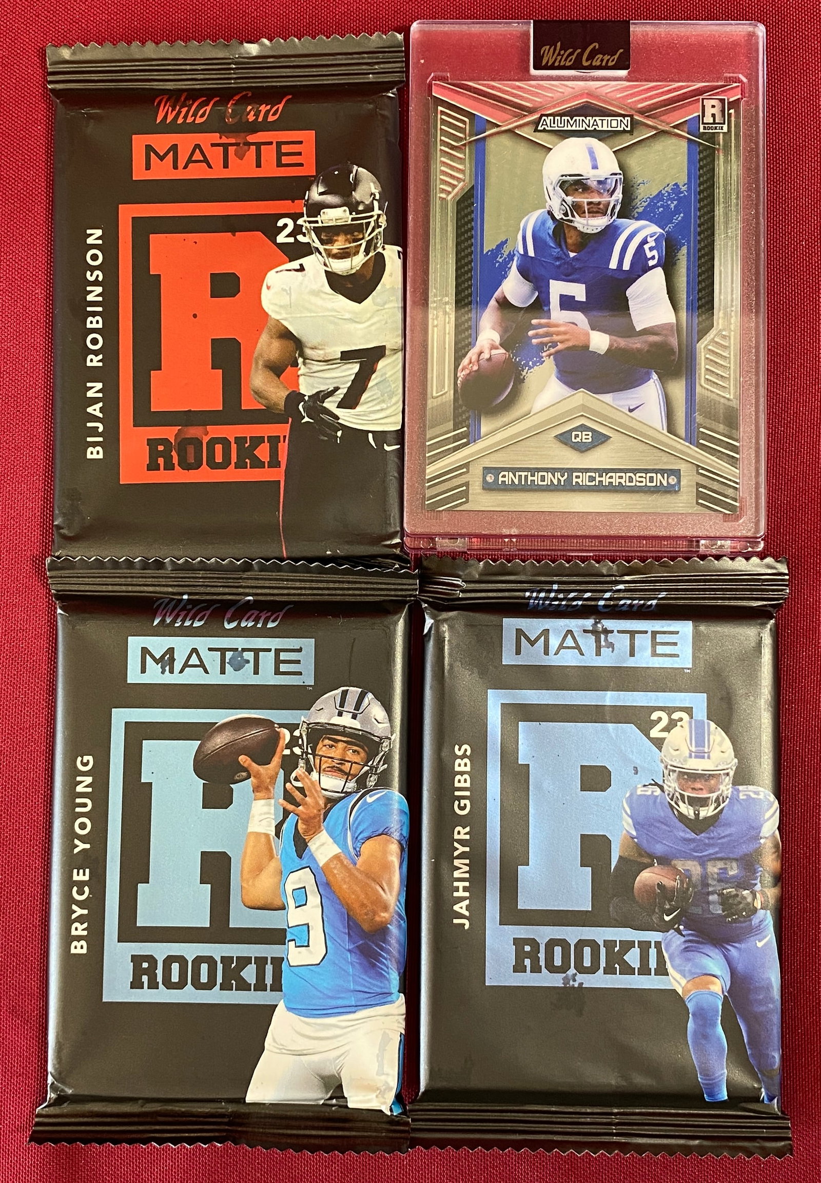 Four Wild Card Rookie Football Cards - Bryce Young, Bijan Robinson, Jahmyr Gibbs, Anthony Richardson: Four Wild Card Rookie Football Cards - Bryce Young, Bijan Robinson, Jahmyr Gibbs, Anthony Richardson -Three Factory Sealed