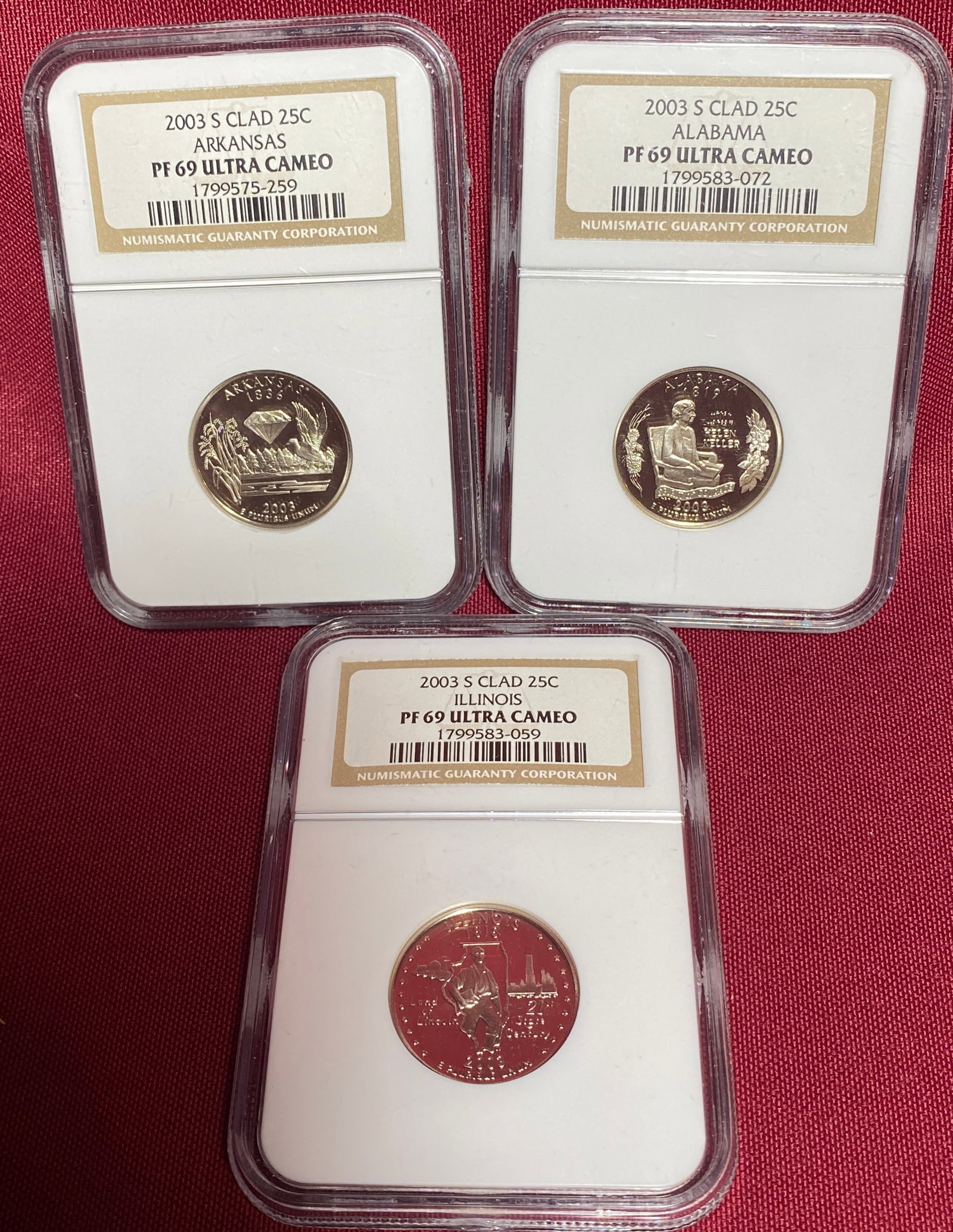 Three NGC Graded PF69 Ultra Cameo 2003-S Clad State Quarters - Arkansas, Illinois, Alabama (1 of 2)