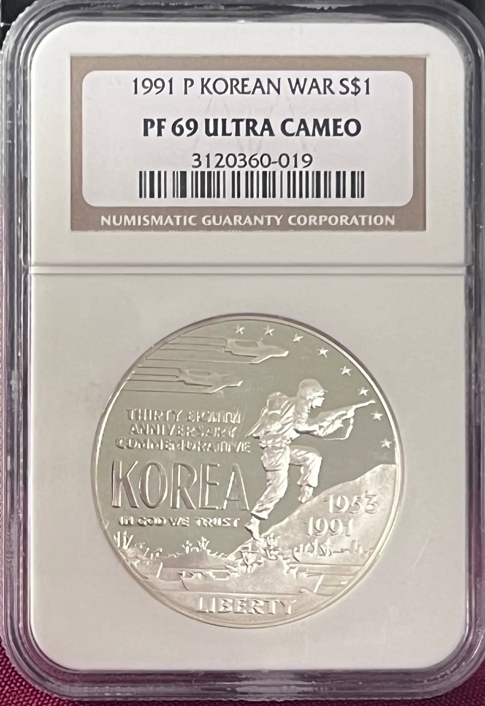 Graded 1991-P Korean War Commemorative Silver Dollar - PF69 Ultra Cameo by NGC: Graded 1991-P Korean War Commemorative Silver Dollar - PF69 Ultra Cameo by NGC