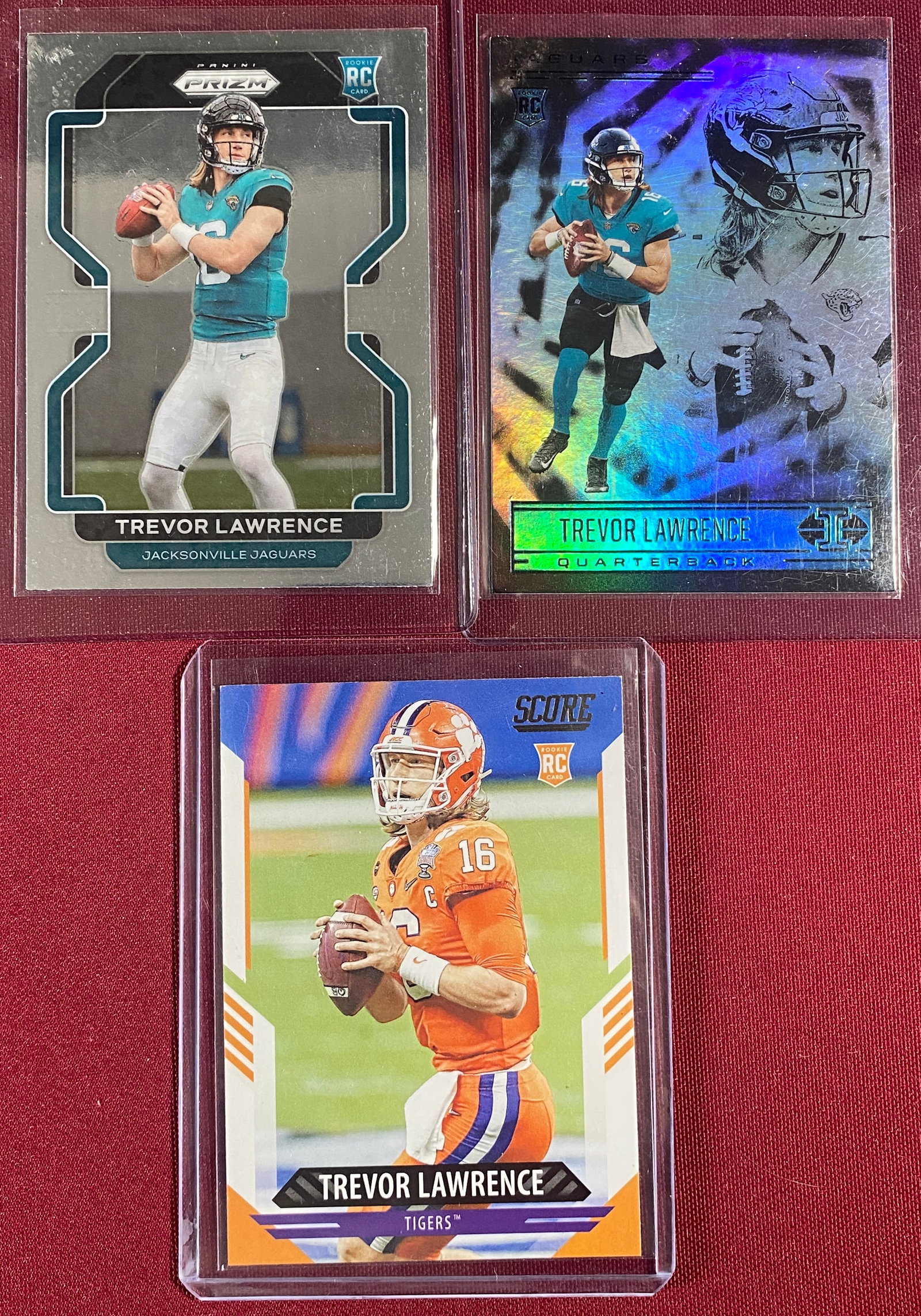 Three Trevor Lawrence Football Cards - 2021 Panini - Score No.301, 2021 Panini - Illusions No.59, (1 of 7)