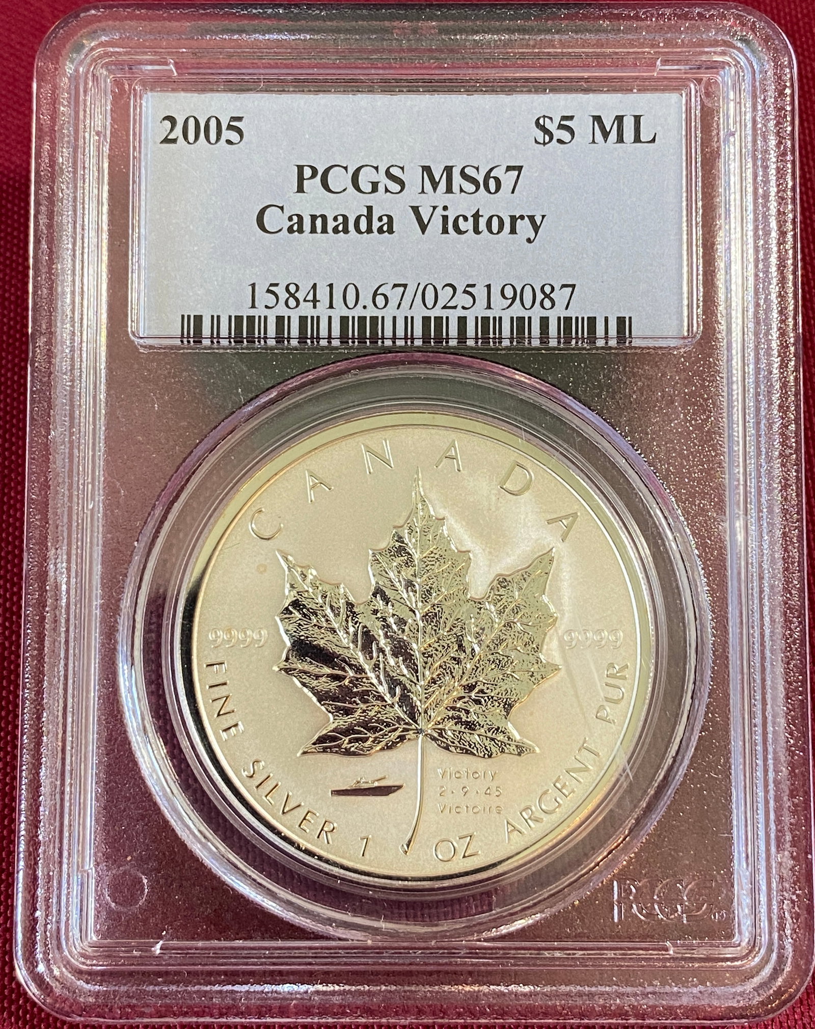 Graded 2004 Canada One Ounce .999 Fine Silver 5 Dollar Coin - Maple Leaf w/ Victory Privy - MS67 by: Graded 2004 Canada One Ounce .999 Fine Silver 5 Dollar Coin - Maple Leaf w/ Victory Privy - MS67 by PCGS