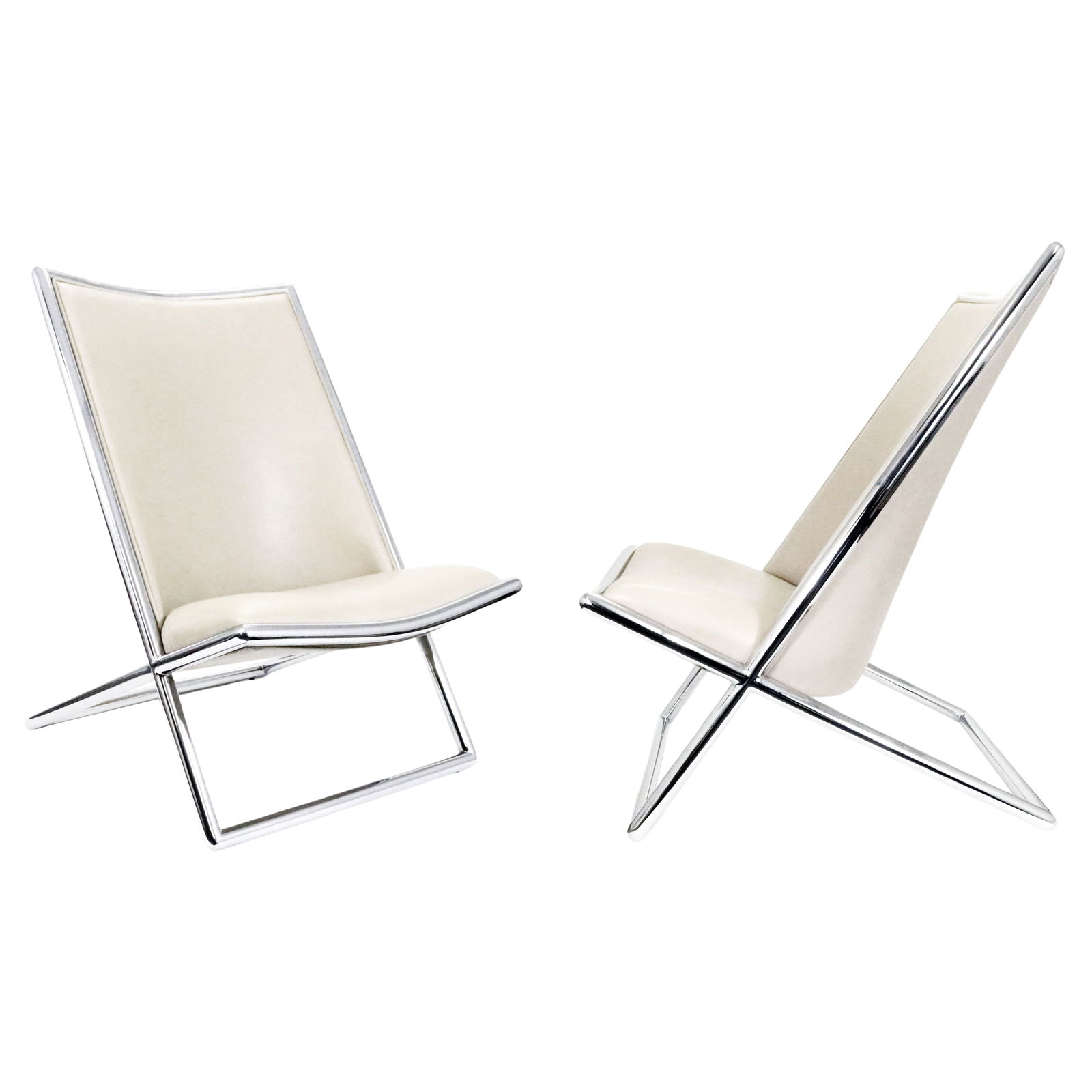 Ward Bennett "Scissor" Lounge Chairs for Brickel: A pair of "Scissor" lounge chairs in chrome and original beige leather by Ward Bennett. USA, 1960s. Unexpectedly comfortable. From the original owner estate in California.