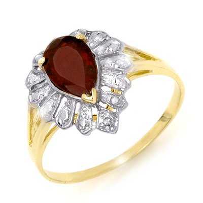 Vintage Style 1.11ctw Garnet & Diamond Ladies Ring Gold: Lot no.: 99040A VINTAGE STYLE 1.11 ctw GARNET & DIAMOND RING GEMSTONE: 1 PEAR CUT GARNET 1.09 ctw DIAMOND: 1 ROUND DIAMONDS 0.02 ctw CLARITY: SI-I COLOR: G-I GOLD: 1.8 GRAMS RING SIZE: 6 1/2