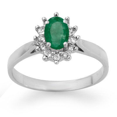 Certified 0.70ctw Emerald & Diamond Ring White Gold: Lot no.: 99123A GENUINE 0.70 CTW EMERALD & DIAMOND RING IN 14KT WHITE GOLD GEMSTONE: 1 OVAL CUT EMERALD 0.50 ctw DIAMOND: 12 ROUND DIAMONDS 0.20 ctw CLARITY: SI-I COLOR: G-I GOLD: 2.60 GRAMS RING SIZE