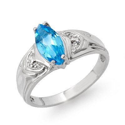 Vintage Style 1.25ctw Diamond & Blue Topaz Ring Gold: Lot no.: 90708 VINTAGE STYLE 1.25 ctw BLUE TOPAZ & DIAMOND RING GEMSTONE: 1 MARQUISE CUT BLUE TOPAZ 1.22 ctw DIAMOND: 2 ROUND DIAMONDS .03 ctw CLARITY: SI COLOR: G-I GOLD: 2.8 GRAMS RING SIZE: 6 1/2
