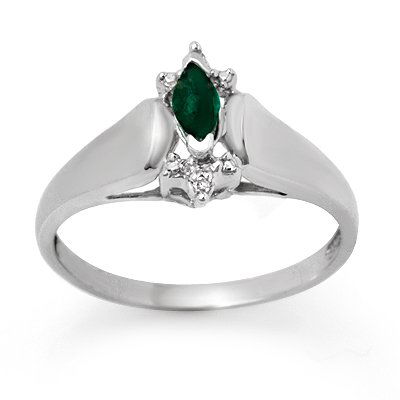 Certified 0.22ctw Diamond & Emerald Ring White Gold: Lot no.: 90002 BRAND NEW , GENUINE 0.22 ctw EMERALD & DIAMOND RING GEMSTONE: 1 MARQUISE CUT EMERALD .20 ctw DIAMOND: 2 ROUND DIAMONDS 0.02 ctw CLARITY: SI3-I2 COLOR: H-K GOLD: 2.1 GRAMS SIZE: 6.5