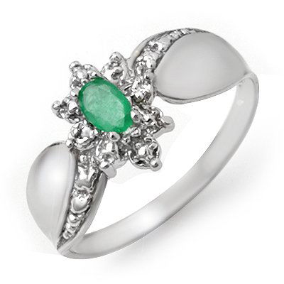 ACA Certified 0.22ctw Emerald & Diamond Ring White Gold: Lot no.: 90008 BRAND NEW 0.22 CTW EMERALD & DIAMOND RING ELEGANTLY SET IN SOLID 10K GOLD. GEMSTONE: 1 MARQUISE CUT EMERALD .20 ctw DIAMOND: 2 ROUND DIAMONDS 0.02 ctw CLARITY: SI3-I2 COLOR: H-K GOLD: 2