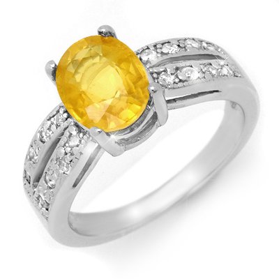 Overstock 2.82ct Yellow Sapphire & Diamond Ring 14KGold: Lot no.: 99532A GENUINE 2.82ctw YELLOW SAPPHIRE & DIAMOND RING IN 14K WHITE GOLD GEMSTONE: 1 OVAL YELLOW SAPPHIRE 2.50ctw DIAMOND: 16 ROUND CUT 0.32 ctw CLARITY: SI2-I1 COLOR: H-J GOLD: APPROXIMATELY 