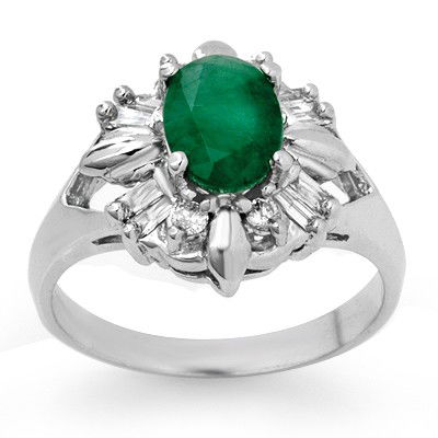 Certified 1.75ctw Emerald & Diamond Ring White Gold: Lot no.: 90631 VINTAGE STYLE 1.75 ctw EMERALD & DIAMOND RING IN 10KT WHTE GOLD GEMSTONE: 1 OVAL CUT EMERALD 1.40 ctw DIAMOND: 4 ROUND & 8 BAGUETTE 0.35ctw CLARITY: SI3-I2 COLOR: H-K GOLD: 4.40 GRAMS S
