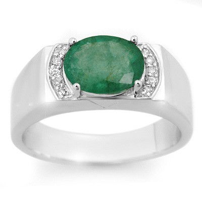 Men's 2.10ctw Diamond & Emerald Ring Solid White Gold: Lot no.: 99782A MEN'S 2.10 ctw DIAMOND & EMERALD RING IN 10KT WHITE GOLD GEMSTONE: 1 OVAL CUT EMERALD 2.0 ctw DIAMOND: 10 ROUND CUT 0.10 ctw CLARITY: SI3-I2 COLOR: H-K SIZE: 10.0 GOLD: APPROXIMATELY 8