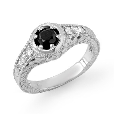 Solitaire 0.80ctw White & Black Diamond Ring 14K Gold: Lot no.: 99383A SOLITAIRE 0.80ctw WHITE & BLACK DIAMOND RING IN 14KT WHITE GOLD BLACK DIAMOND: 1 BRILLIANT CUT 0.50 ctw DIAMOND ACCENT: 6 ROUND CUT 0.30 ctw CLARITY: OPAQUE / SI3-I2 COLOR: BLACK / H-K