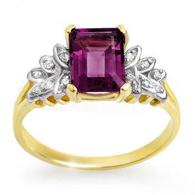 Genuine 1.52ctw Amethyst & Diamond Ring 10K Yellow Gold: Diamond: 12 Round cut @ 0.12 ctw Clarity: SI-I Color: H-KGemstone: Natural AmethystGemstone color: PurpleGemstone quality: Good-to-Very GoodGemstone Cut & Weight: 1 Emerald cut @ 1.40 ctwMetal Purity