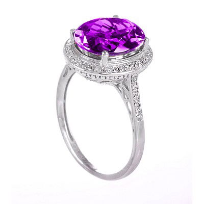 GENUINE 4.63 ctw DIAMOND and AMETHYST RING 14K WHITE GO: Diamond count: 24 Round cut Diamond weight: 0.13 CT Diamond Color & Clarity: I/ SI1-SI2Gemstone count: 1 Oval cut AMETHYST @ 4.5 CT Gemstone quality: AA Metal: 14K WHITE GOLD Approx. 3 grams Dimension