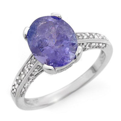Genuine 4.5ct Tanzanite & Diamond Ring 14K White Gold: Diamond: 62 Round cut @ 0.50 ctw Clarity: SI-I Color: H-KGemstone: Natural TanzaniteGemstone color: PurpleGemstone quality: Good-to-Very GoodGemstone Cut & Weight: 1 Oval cut @ 4.0 ctwMetal Purity & C