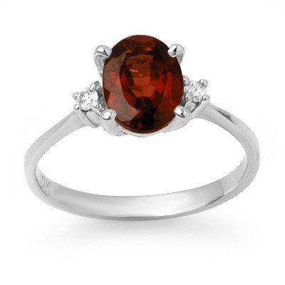 Genuine 1.54 ctw Garnet & Diamond Ring 10K White Gold: Genuine 1.54 ctw Garnet & Diamond Ring 10K White Gold, Diamond: 2 Round cut @ 0.03 ctw Clarity: SI-I Color: H-KGemstone: Natural GarnetGemstone color: RedGemstone quality: Good-to-Very GoodGemstone Cu