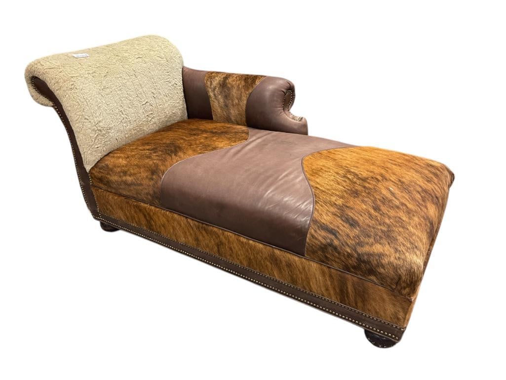 CUSTOM MADE RANCHERS COWHIDE AND LEATHER CHAISE LOUNGE: FEATURING INCREDIBLE COWHIDE UPHOLSTERY PERFECT FOR A WESTERN THEME, COTTON BACK, LEFT SIDE ARMÂ 64" X 28" X 17" SEAT HEIGHT