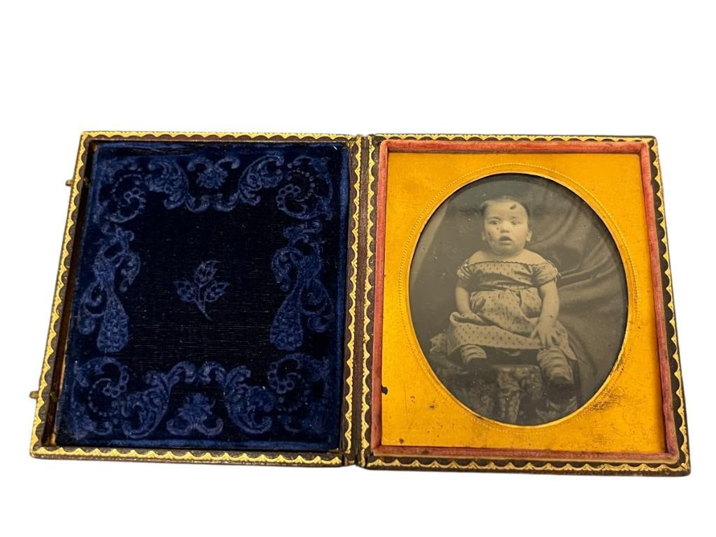 ANTIQUE VICTORIAN DAGUERREOTYPE OF A BABY GIRL PERCHED ON A FOLIATE PATTERN STOOL (1 of 9)