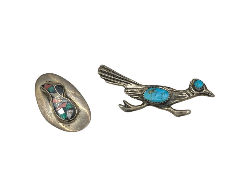 TWO NATIVE AMERICAN STERLING SILVER BROOCHES: INCLUDES SIGNED ISRAEL REUVENÂ INLAID BROOCH THAT CAN ALSO BE WORN AS A PENDANT, AS WELL AS A ROAD RUNNER WITH TURQUOISE IN CENTER LARGEST IS 2 1/2", 11.06 GRAMS