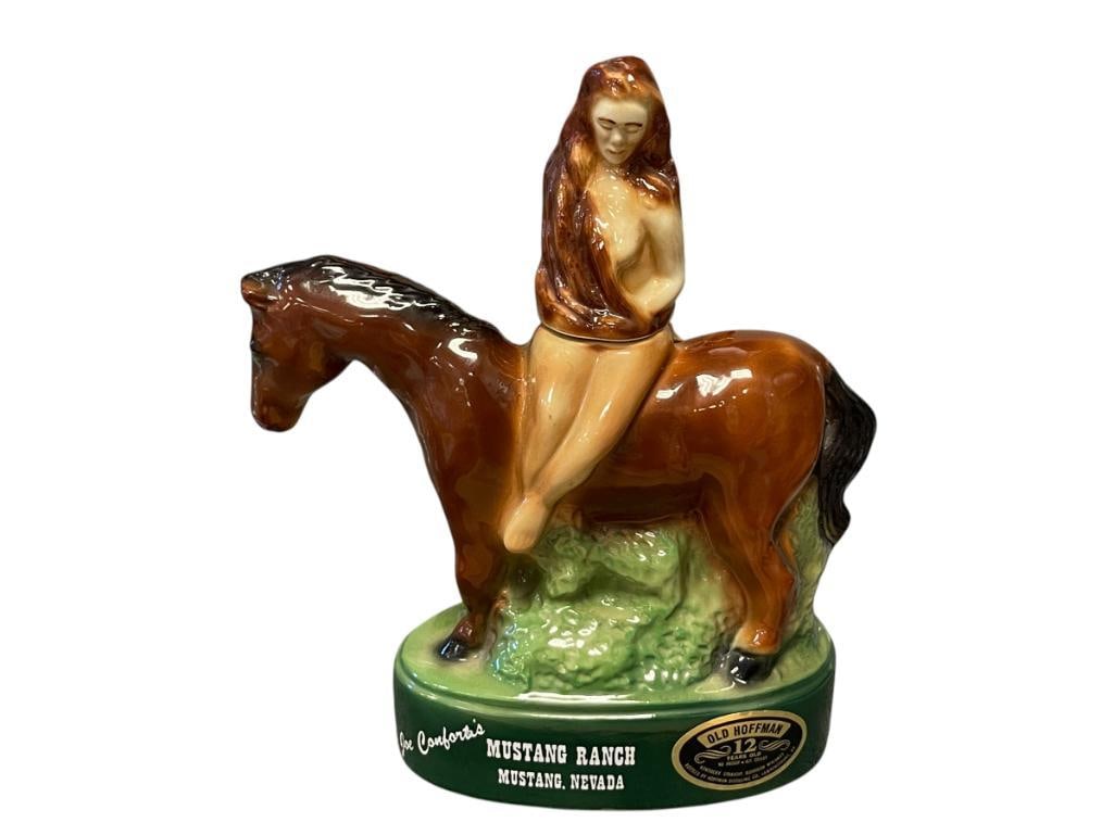 VINTAGE MUSTANG RANCH LADY GODIVA LIQUOR DECANTER MUSTANG, NEVADA JOE CONFORTE'S BROTHEL: OLD HOFFMAN 12 KENTUCKY BOURBON, NO CONTENTS, 1974, MIKE WAYNE ORIGINAL EMBOSSED ON BOTTOM,Â THE MUSTANG RANCH DECANTER REFERS TO A COLLECTIBLE ITEM THAT IS OFTEN ASSOCIATED WITH A TYPE OF L
