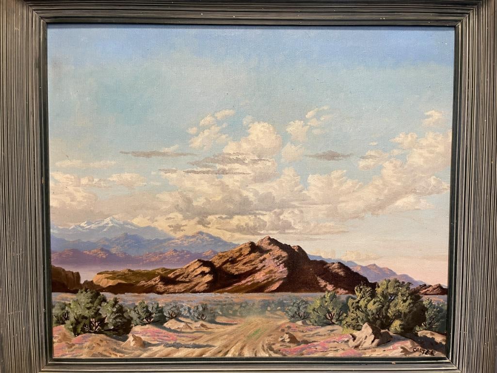 LISTED NEVADA ARTIST GEORGE CARTER "ROAD TO NOWHERE" ORIGINAL OIL ON CANVAS PAINTING: THESE INCREDIBLE PAINTING DEPICTS A CLASSIC SCENE DONE BY THE RENOWN NEVADA ARTIST GEORGE CARTER, FEATURING DEEP BLUES AND PURPLES IN THE MOUNTAIN RANGES AND IS ALWAYS IMPRESSIVE CLOUDS ROLLING OVER T