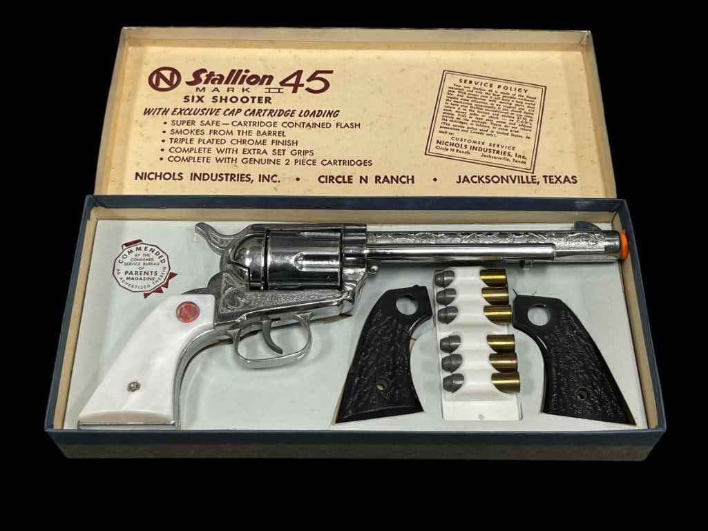 VINTAGE 1950'S NICHOLS RANCH STALLION 45 MARK II SIX SHOOTER CAP GUN IN ORIGINAL BOX: "CIRCLE N RANCH," MOTHER OF PEARL STYLE GRIPS WITH EXTRA GRIPS, IN LIKE-NEW CONDITION, INCLUDES ORIGINAL BOX