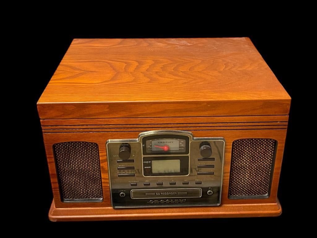 CROSLEY VINTAGFE INSPIRED RECORD PLAYER WITH AM/FM/CD MODEL CR245: INCLUDES REMOTE AND MANUAL 18" X 14" X 10"