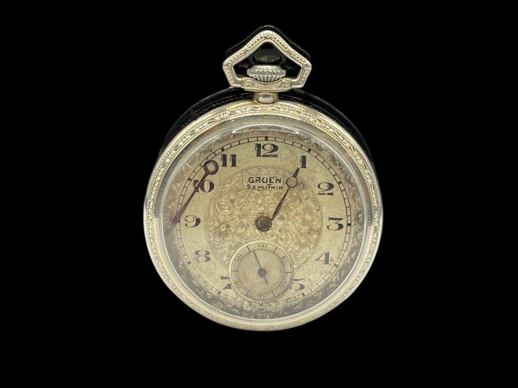 CIRCA 1870 GRUEN SEMITHIN GRADE 754 15 JEWELS POCKET: OPEN FACE, GRUEN GUILD, TWO POSITIONS ADJUSTED, IN RUNNING CONDITION, 14K GOLD FILLED WADSWORTH CASE, HAND AND MINUTE HAND NEED TO BE RE-ATTACHED BUT ARE PRESENT INSIDE CRYSTAL SIZE 12S