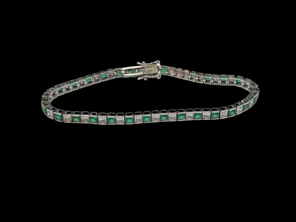 STERLING SILVER GREEN AND WHITE CZ TENNIS BRACELET: 7 1/2" X 3/16", 11.04 GRAMS