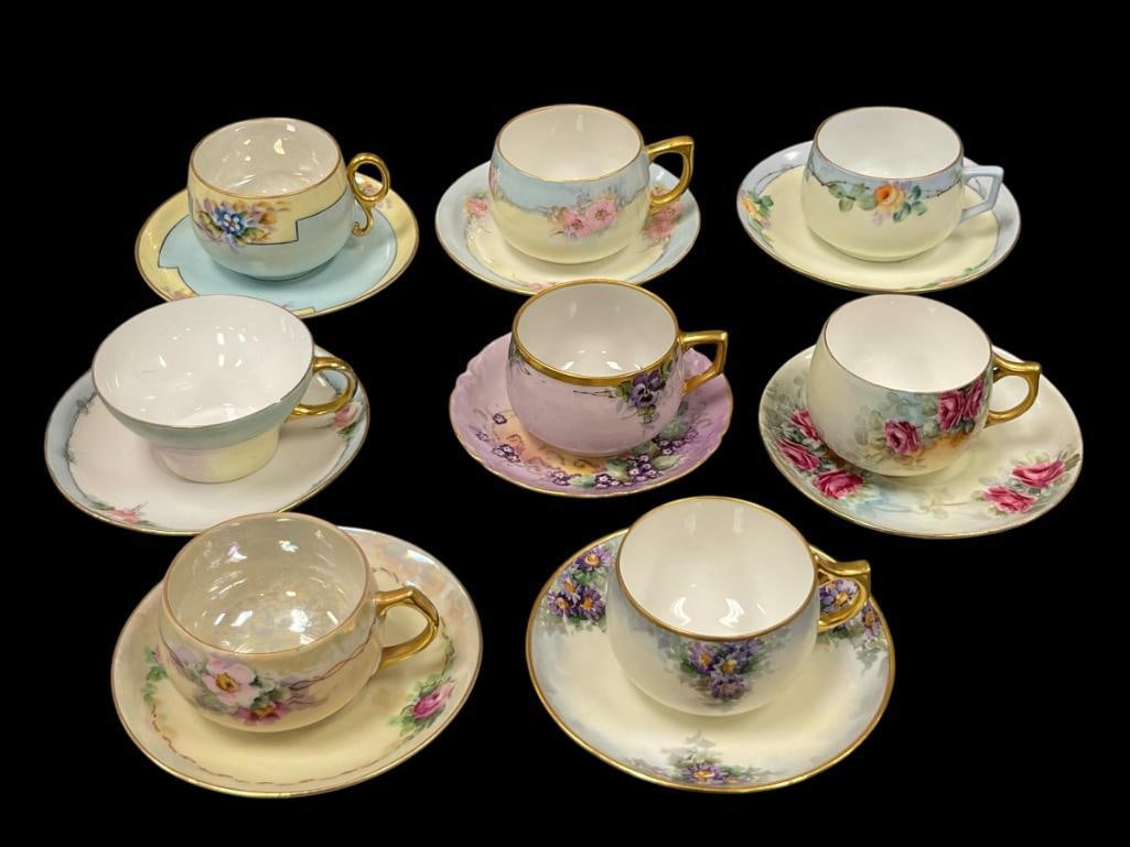 EARLY 20TH CENTURY BAVARIAN PORCELAIN TEA CUPS AND SAUCERS, ALL FLORAL DESIGN WITH GILT ACCENTS: ONE SET DOES NOT QUITE MATCH, ONE TEA CUP HAS CHIPPED RIM Â 