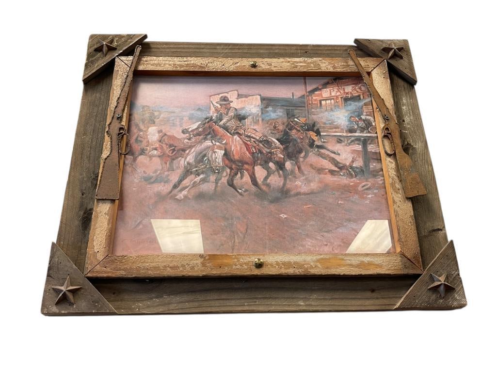CHARLES M. RUSSELL (1864-1926) RENOWN AMERICAN WEST ARTIST AND SCULPTOR SHOOT OUT PRINT: "SMOKE OF A .45" WESTERN PRINT DEPICTS COWBOYS ON HORSEBACK SHOOTING INTO AN OLD PARLOR IN THE MIDDLE OF TOWN, RECLAIMED WOOD FRAME DECORATED WITH STARS AND RIFLE CUTOUTS 27" X 23"