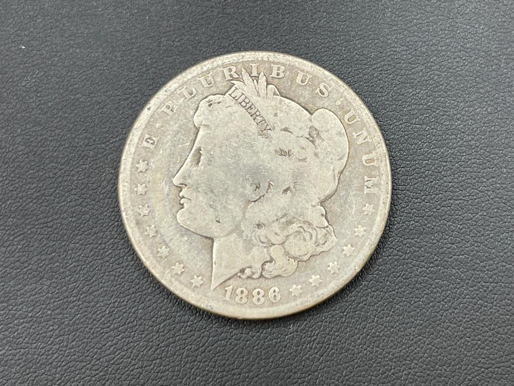 1886 U.S. MORGAN SILVER DOLLAR (1 of 6)