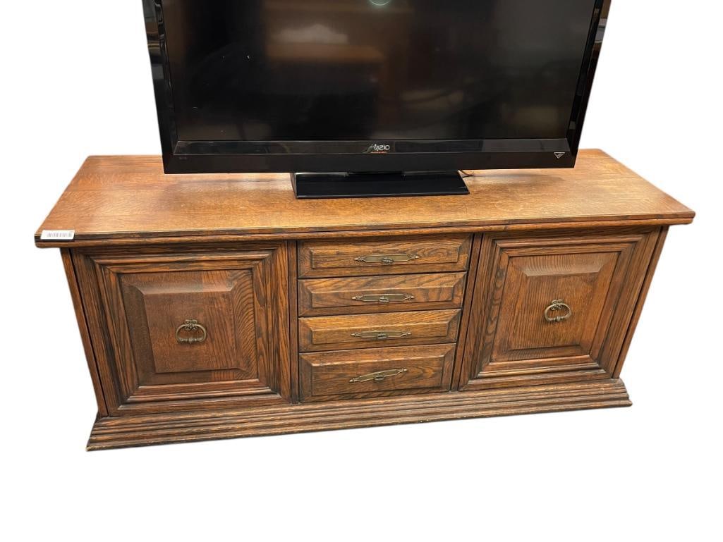 VINTAGE SOLID OAK CONSOLE TABLE FEATURING THREE DRAWERS AND TWO CABINETS: MISSING SHELVES IN CABINETS 63" X 20" X 26 1/2"