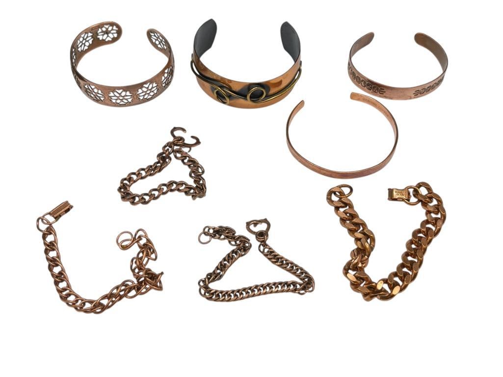 ASSORTED COPPER BRACELETS INCLUDING FOUR CUFF BRACELET AND FOUR LINK BRACELETS: VARIOUS LENGTHS AND SIZES