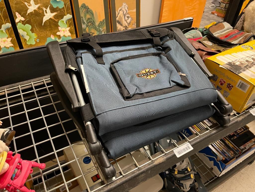 TWO QUEST STADIUM CHAIRS WITH PADDED SEATS: IN GREAT CONDITION, WITH STORAGE ZIPPER POCKETS, EASY CARRYING STRAP 22" X 16" WHEN CLOSED
