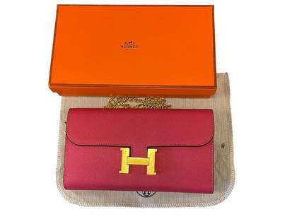 MARKED "HERMES" CONSTANCE EXTREME EPSOM MARQUETTE CONSTANCE TOGO WALLET WITH GOLD CHAIN: "HERMES" CONSTANCE TO GO WALLET WITH GOLD FINIH LEATHER CHAIN WITH "H" BUCKLE. INCLUDES ORIGINAL BOX AND DUST COVER, NOT AUTHENTICATED, NEW CONDITION 8"