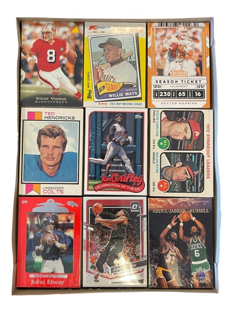APPROX. 450 ASSORTED SPORTS CARDS INCLUDING MLB, NFL, AND NBA: FEATURING STARS AND HALL OF FAMERS, JOHN ELWAY, KEN GRIFFEY JR., WILLIE MAYS, PEYTON MANNING, AND MORE, SEALED IN NINE PACKS