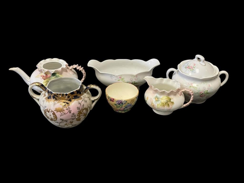 AUSTRIA AND ENGLISH PORCELAIN CHINA, ASSORTED PIECES INCLUDING GRAVY BOAT, SUGAR BOWL, CREAM PITC...: ROYAL AUSTRIA FLORAL DESIGN GRAVY BOAT AND MATCHING SUGAR BOWL, ENGLISH SHELLEY TEA CUP, SIX PIECES TOTAL, THREE PIECES ARE UNMARKED, SUGAR BOWL AND SMALL TEA POT ARE MISSING TOPS 3" UP TO 7 1/8"