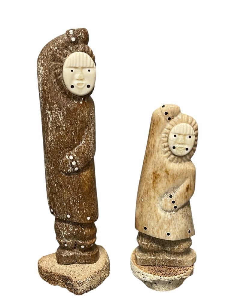 ALASKA INUIT FOSSILIZED WHALE BONE HAND CARVED ESKIMO FIGURES SIGNED: ALASKAN INUIT FOSSILIZED WHALE BONE FIGURAL CARVINGS, ESKIMO CARVED FIGURES, EACH FIGURE IS SIGNED ON BOTTOM 6" AND 8" H