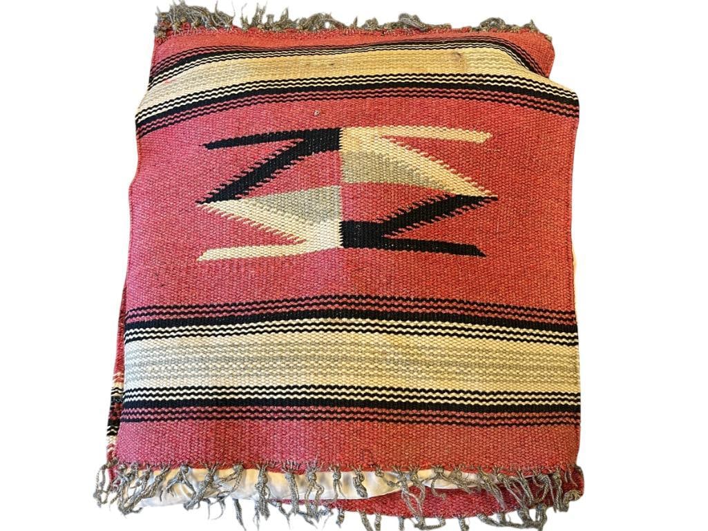 20TH CENTURY NATIVE AMERICAN CHIMAYO THROW PILLOW FEATURING GEOMETRIC DESIGN WITH THICK BANDS: RED IN COLOR WITH GEOMETRIC DESIGN IN BLACK, BROWN, AND WHITE, EACH SIDE OF THE PILLOW NEED TO BE RESTITCHED, NO DAMAGE TO WEAVING 13" X 15"