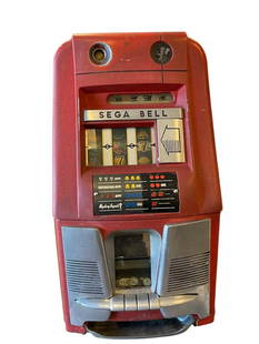 1940'S MILLS SEGA BELL 10 CENT / DIME THREE-REEL SLOT MACHINE: WOODEN CASE, METAL RED FINISH FRONT, CHROME FINISH HANDLE, AND ALUMINUM FRONT COVER AND NAME TAG, 3-REEL SLOT MACHINE, ALL GLASS INTACT, BOTTOM WOOD PLATE IS DAMAGED, SEE PHOTO, NO KEYS, MUST BE A NEV