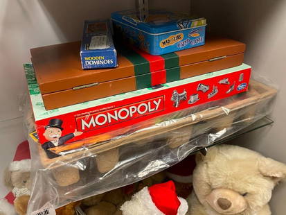 FAMILY BOARD GAMES INCLUDING MONOPLY, MAD LIBS CARD GAME, WOODEN DOMINOES ETC.: NATIONAL GEOGRAPHIC DINOSAUR DIG, BACKGAMMON, MONOPOLY, WOODEN DOMINOES, AND MAD LIBS CARD GAME