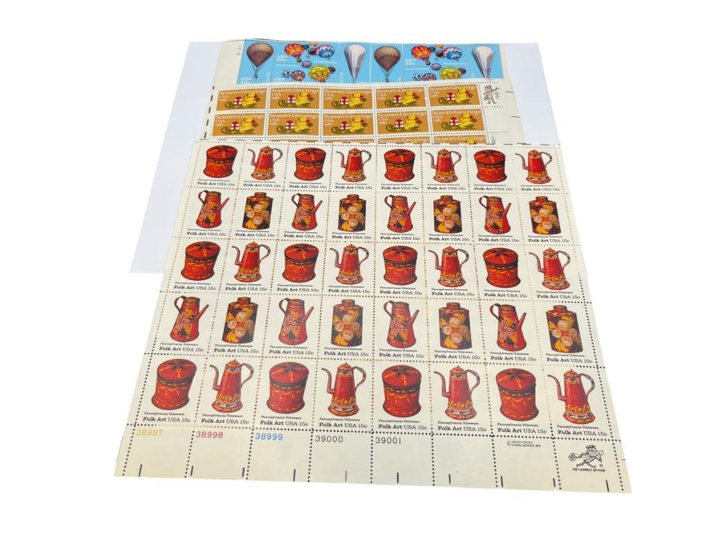 UNCUT MINT U.S. STAMP SHEETS INCLUDING FOLK ART 15 CENTS, SEASON'S GREETINGS 1981, AND MORE: ALSO INCLUDES HOT AIR BALLONIING 20 CENTS, ALL UNCUT MINT SHEETS, MORE THAN $15 FACE VALUE IN STAMPS
