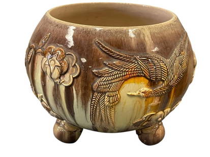 THREE FOOTED VINTAGE DRIP GLAZE POTTERY LARGE POT WITH PHOENIX AND FLORAL DESIGN: THREE FOOTED DRIP GLAZE POTTERY RELIED PHOENIX AND FLORAL DESIGN POT, EARTH TONE COLORS 9 1/2"