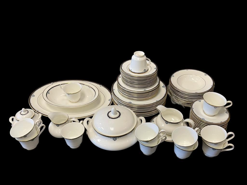 ROYAL DOULTON PRINCETON 1985 ENGLISH FINE BONE CHINA: INCLUDES, DINNER PLATES, SALAD PLATES, BREAD PLATES, TEA CUPS AND SAUCERS, SOUP BOWLS, COVERED BOWL, VEGETABLE BOWL, GRAVY BOAT AND SAUCER, AND SUGAR AND CREAMER, ONE SALAD PLATE HAS A CHIP AND ONE TE