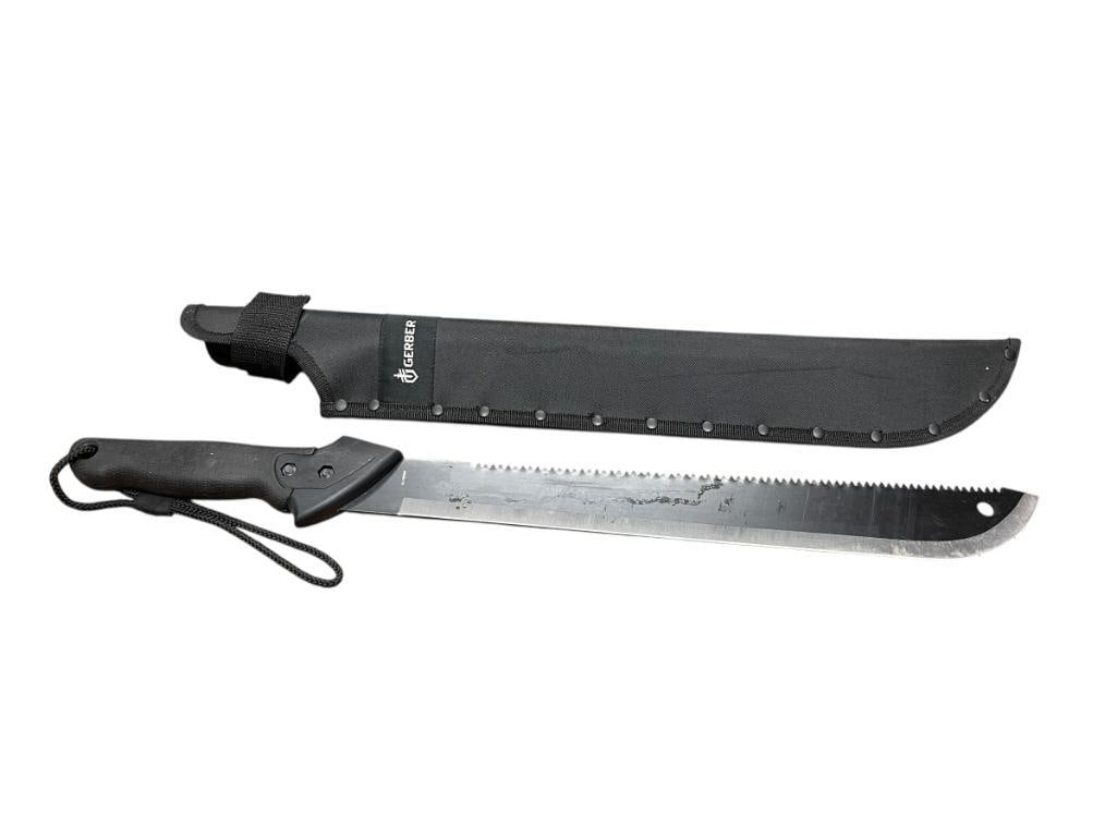 GERBER MACHETE FEATURING BLACK TO STAINLESS STEEL BLADE, SERATED BACK, AND ORIGINAL SHEATH BY GER... (1 of 12)