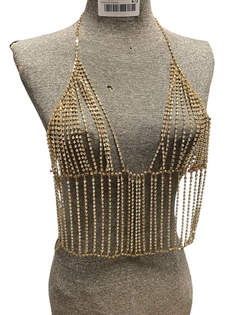 STUNNING GOLD PLATED AND CLEAR RHINESTONE LADIES BODY JEWELRY: FEATURING SHIRT DESIGN WITH ELEGANT STRANDS OF RHINESTONES POSSIBLY MEDIUM SIZE