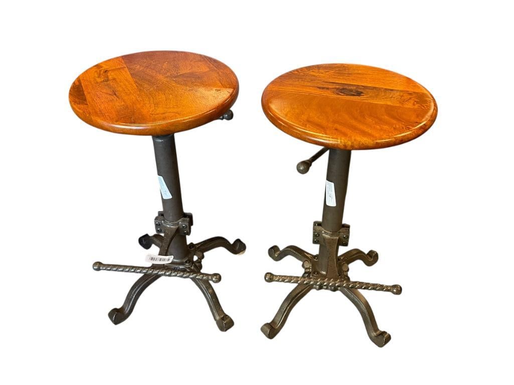 PAIR OF CAST IRON IDUSTRIAL STYLE SCREW HEIGHT ADJUSTABLE BAR STOOL SWITH WOOD SEAT: PAIR OF INDUSTRIAL SCREW HEIGHT ADJUSTABLE BAR STOOLS WITH ROUND WOODEN SEAT AND CAST IRON FOOT REST 13 1/2" ROUND, 22 1/2" UP TO 33" H