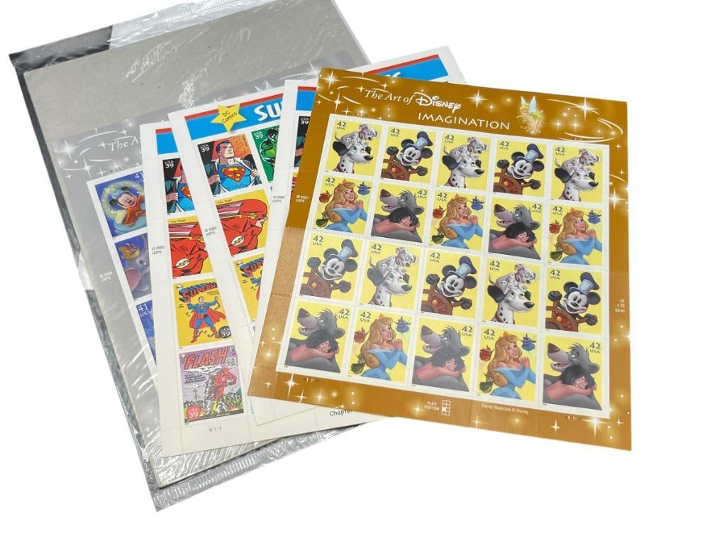 UNCUT U.S. MINT DISNEY AND DC COMICS STAMP SHEETS: INCLUDES 39 CENT, 41 CENT, AND 42 CENT STAMPS, "THE ART OF DISNEY MAGIC," "THE ART OF DISNEY IMAGINATION," AND "DC COMICS SUPER HEROES" APPROX. $40 FACE VALUE IN STAMPS